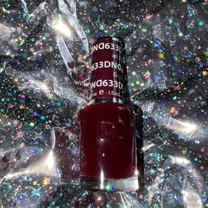 BRAND NEW DND REGULAR POLISH IS THE COLOR GARNET RED